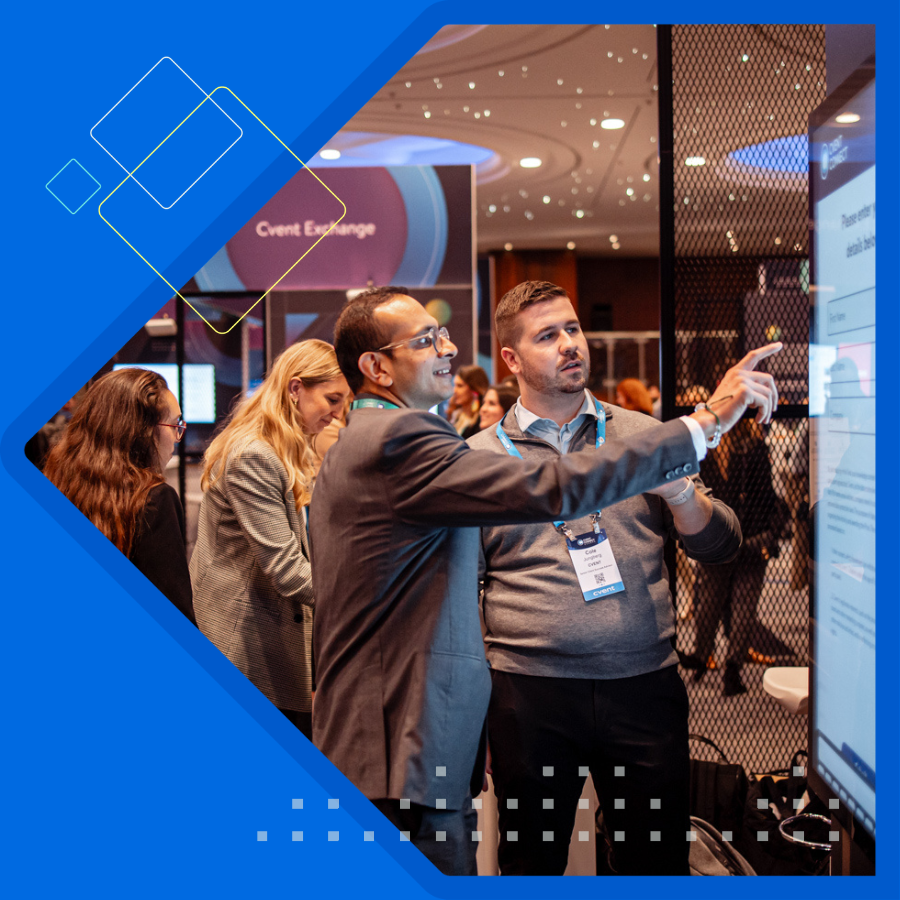 Two men and one women sitting facing latop.