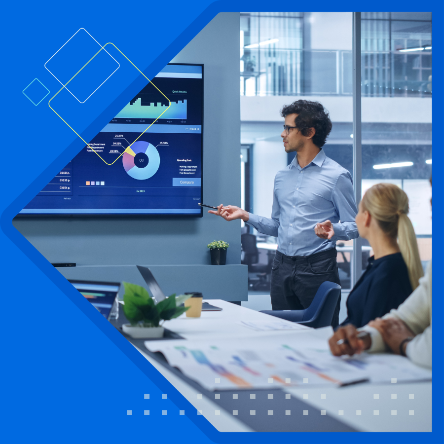 Two men and one women sitting facing latop.